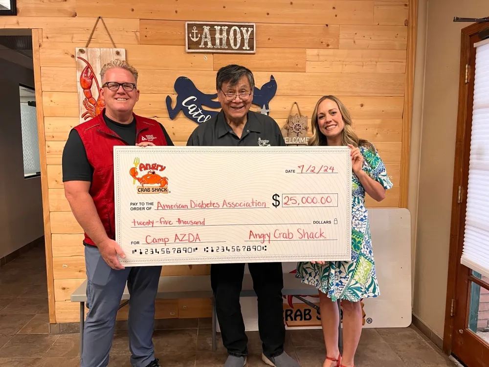 A $25,000 cheque from Angry Crab Shack to the American Diabetes Association
